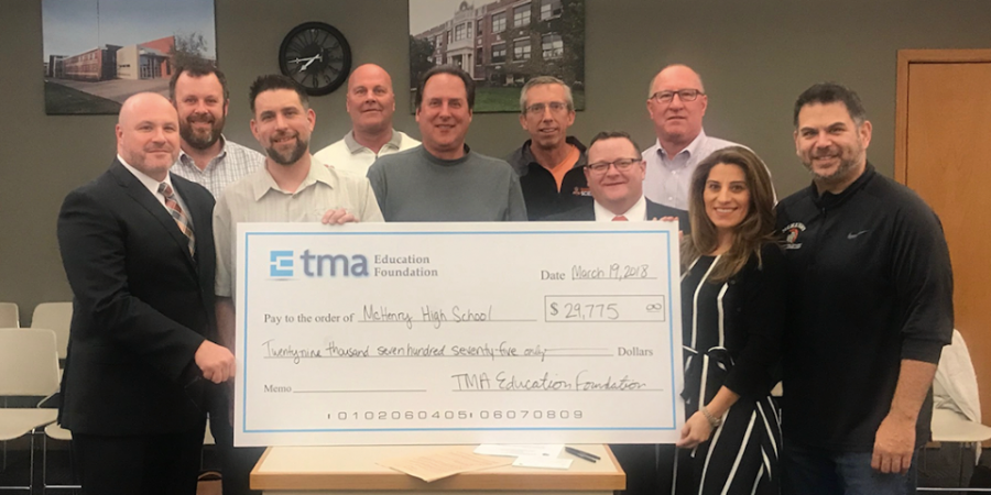 
Gaylord Rodeman accepts a grant from TMA for the MCHS manufcturing program.