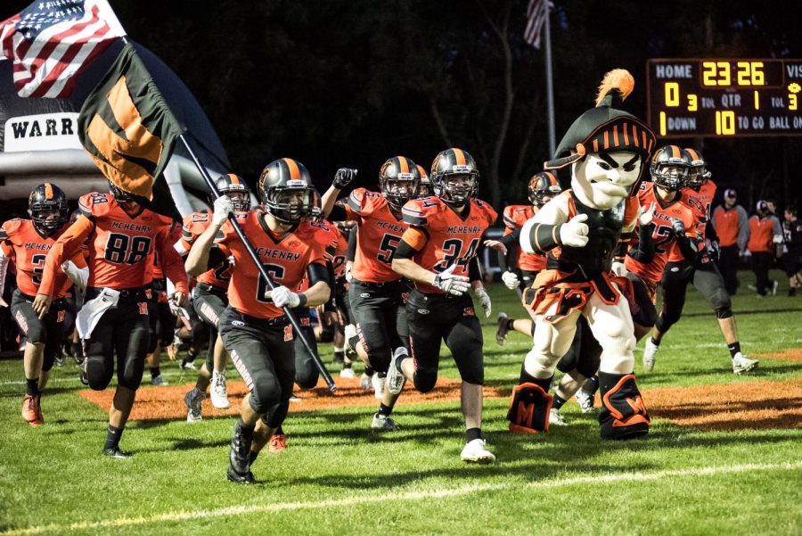 
Leonidas leads the Warriors onto the football field during the 2018 Homecoming game against Cary-Grove on September 28. The 2019 team went into Homecoming with a record of 3-2.