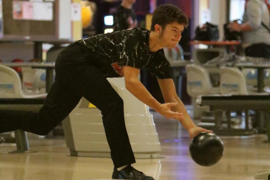 Senior Jacob McLean practices with the boys bowling team in December of 2018 at Raymonds Bowl in Johnsburg, IL. McLean committed to bowl with Highland College,  won the NJCAA tournament last year.