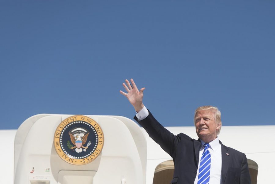 President Donald Trump waves to supporters from Air Force One onSeptember 6 in Mandan, ND following an event with energy workers. The inquiry surrounding President Trumps impeachment has dominated the news cycle since a whistleblowers report became public in September.