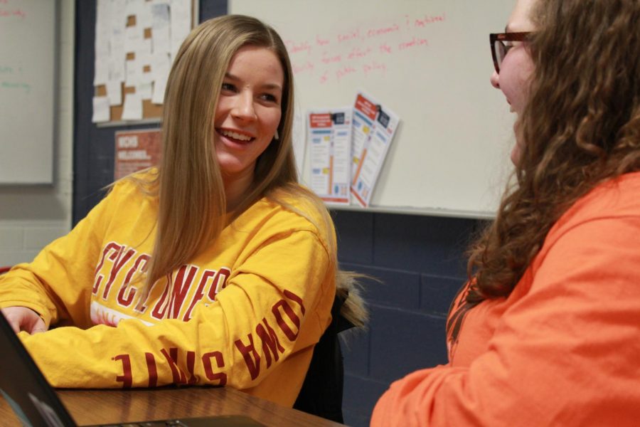 West StuCo president Julia Druml talks with Kaili Wegener about Student Council plans. The student leadership groups at both West and East have made efforts to hear from students in both buildings during open meetings before school, during lunch, and during AIM.