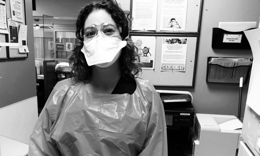 Lauren Horrocks, an ER nurse at Advocate Good Shepherd Hospital in Barrington, wears a mask and extra protection as the hospital makes preparations for COVID-19 testing and treatment.