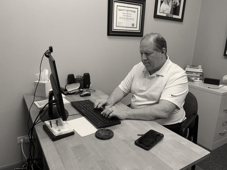 Working harder than ever, Dr. Robert Kohn sees patients electronically to ease the anxiety caused by the COVID-19 shutdown. 