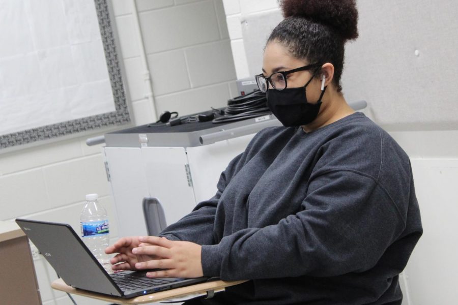 A+student+sits+on+her+Chromebook+during+an+in-person+class+at+West+on+January+27.%2C+one+week+after+MCHS+back+from+a+semester+fully+remote.
