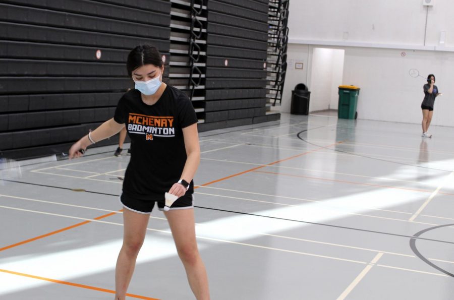 Gisselle Sandoval serves the birdie over the net during a badminton practice on February 16 in the West Campus Main Gym. The team’s first match takes place on February 22.