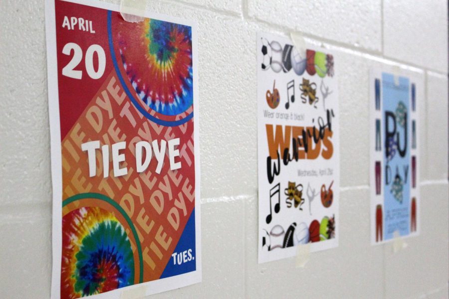 Student council at both buildings made plans for a special spirit week for an unusual spring Homecoming week. These signs hang at West Campus advertising  these spirit days and other events during Homecoming.