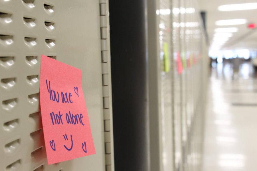 A note on a locker in the hallways at West Campus promotes Start With Hello Week, an initiative promoted by  Student Council to spread positivity during the week of April 5.