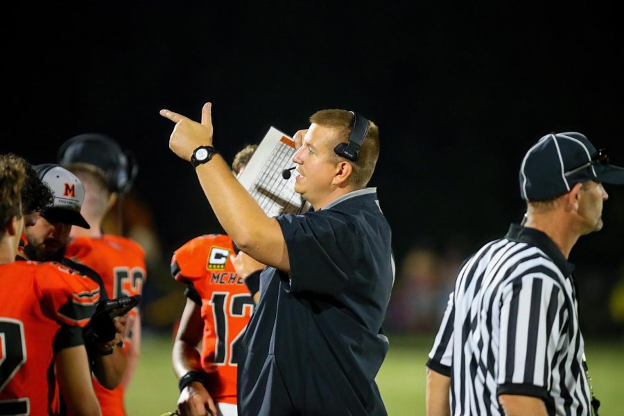 Niemic directs his varsity football team during the Homecoming football game. 