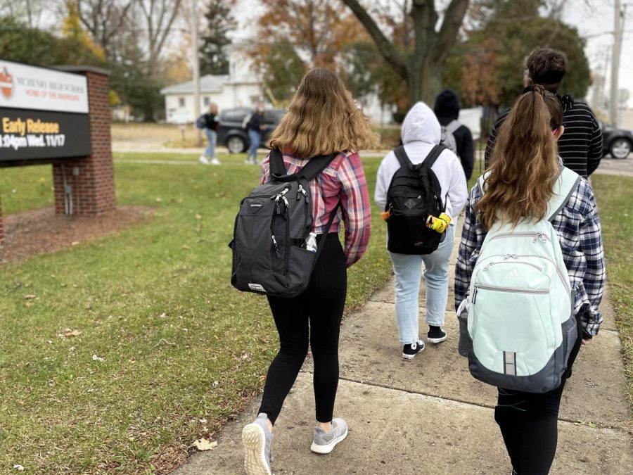 Students walk down Green Street after early release on Wednesday outside of the Freshman Campus. This year is the first year that MCHS is releasing students early on select Wednesdays.