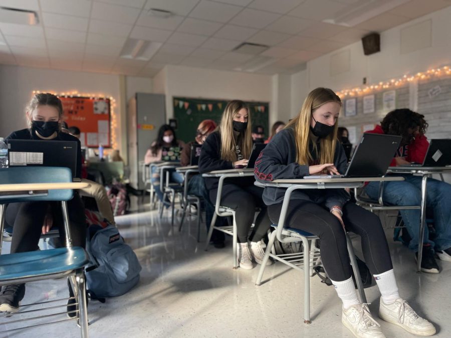 Freshmen work on their final project for Leah Nolans English I Honors class on December 1 in room 409 at the Freshman Campus. English is a core class that all students must take at MCHS.