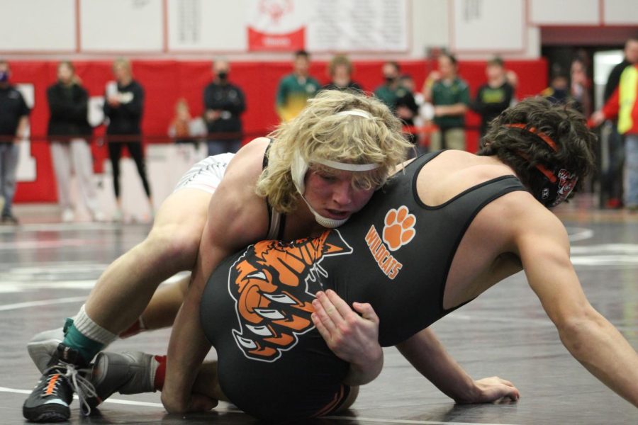 Brody Hallin wrestles at the Barrington Sectionals tournament on Feb. 12. 