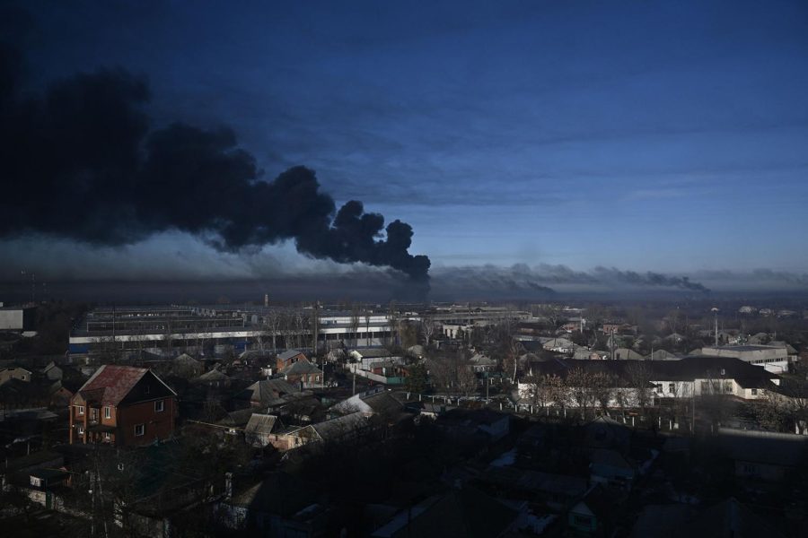 Black smoke rises from a military airport in Chuguyev near Kharkiv, Ukraine, on Feb. 24, 2022.