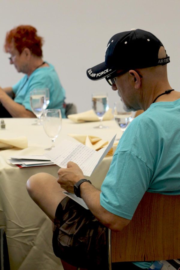 Veterans read letters from loved ones during dinner at the National Museum of the United States Army during the Veteran Honor Flight trip to Washington, D.C. on Aug. 27.
