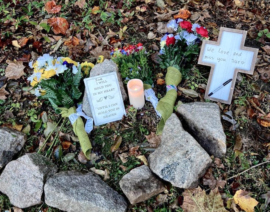 Family members of Susan Kanantz left items and messages as part of a makeshift memorial after she was killed in a mass shooting in Raleigh, North Carolina last month.