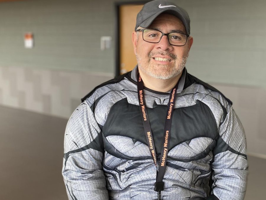 Arturo Delgadillo, dressed fittingly as a super hero for Halloween, poses in the Center for Science, Technology and Industry. Formerly a police officer, Delgadillo now supervises the security teams at both the Upper and Freshman Campuses.