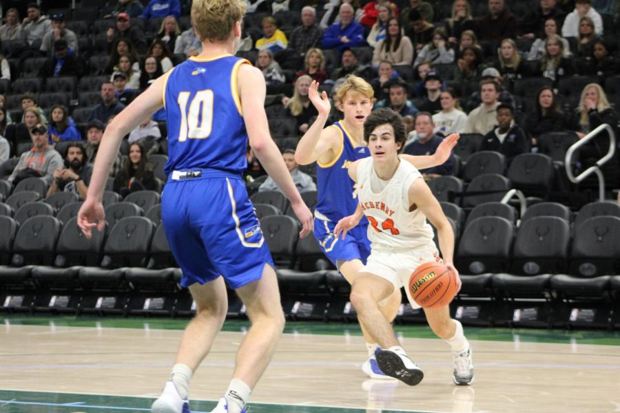 Marko Visnjevac dribbles the ball down the court on Sunday, Nov. 27 against Johnsburg at the Fiserv Forum in Milwaukee where the Bucks play.