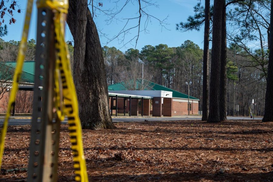 Police tape hangs from a sign post outside Richneck Elementary School following a shooting on Jan. 7, 2023, in Newport News, Virginia. A 6-year-old student was taken into custody after reportedly shooting a teacher during an altercation in a classroom at Richneck Elementary School on Friday. The teacher, a woman in her 30s, suffered “life-threatening” injuries and remains in critical condition.