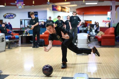 Joesph Thome releases the bowling ball down the lane about to strike success at Raymonds Bowl on Jan. 11. 