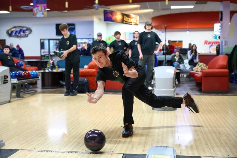 Joesph+Thome+releases+the+bowling+ball+down+the+lane+about+to+strike+success+at+Raymonds+Bowl+on+Jan.+11.+