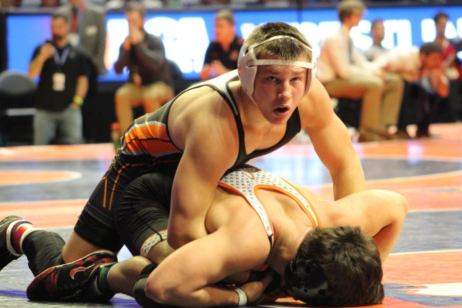 On Feb. 16-18, Chris Moore competed in the IHSA state wrestling tournament at the State Farm Center in Champaign.