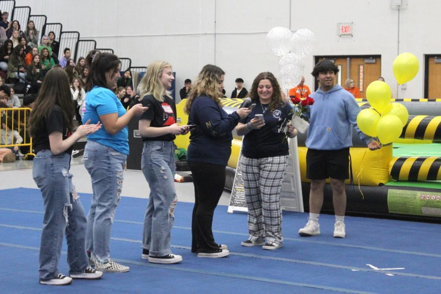 Students are announced as part of prom court during the spring spirit rally in the Upper Campus Main Gym on March 23.