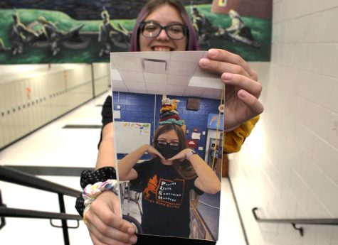 Sophomore Kaylie Szczepanik holds a picture of her from her freshman year. A lot has changed in the year since she left the Freshman Campus, but not all sophomores have adjusted to the shift as well as she has.