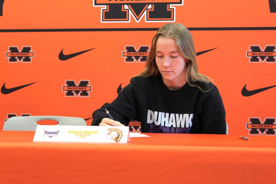 Emerson Gasmann participates in MCHSs signing event to celebrate her commitment to playing a sport at a collegian level on May 9.