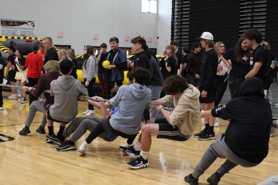 Freshman and their senior leaders compete in activities at a spirit rally during the UC Sneak Peek on April 21 in the Upper Campus main gym.