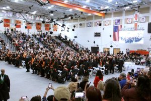 Students, parents, faculty, administration and the board of education celebrate the Class of 2022 during last year’s graduation ceremony on May 21 in the Upper Campus main gym. The ceremony was planned for McCracken but moved inside due to poor weather conditions.