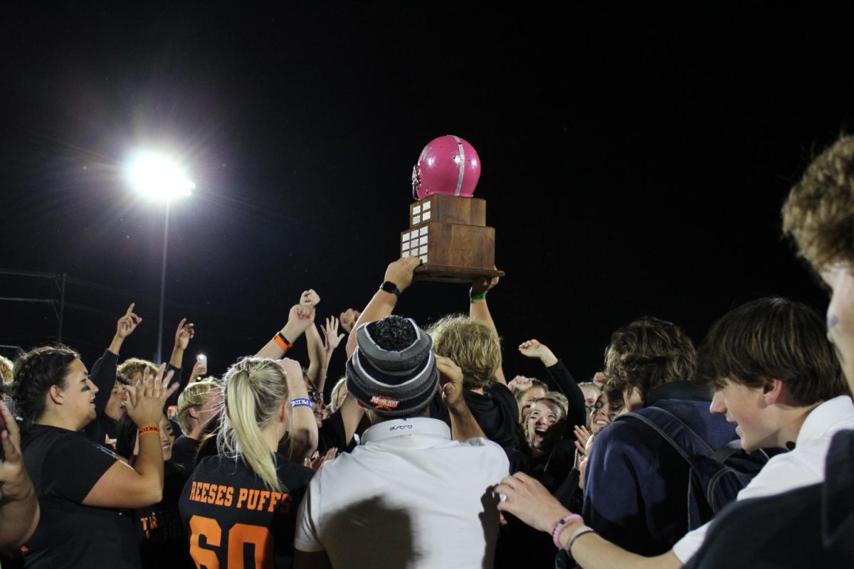 Seniors celebrate their victory during last year’s Powder Puff football game on Oct. 5 at McCracken Field. This year’s game will take place on Sept. 27 on the field.