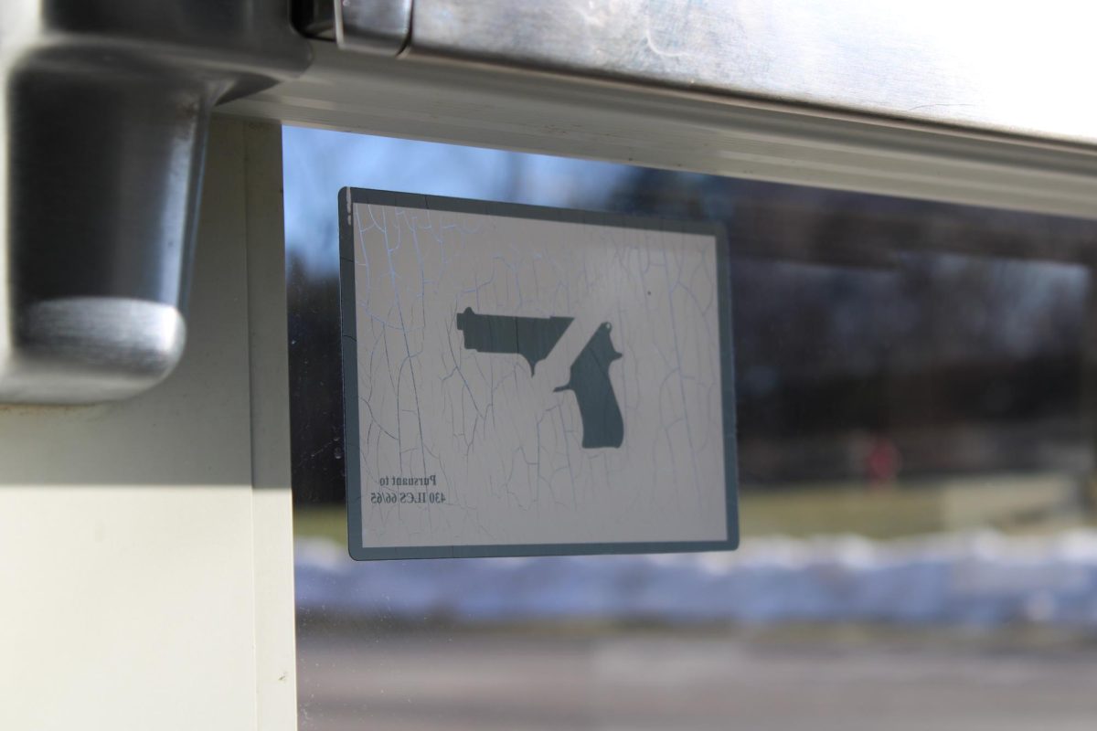 Old, faded signs on the doors to the Upper Campus that restrict firearms at the school would do little to stop a school shooting, but MCHS has put measures in place to protect students.
