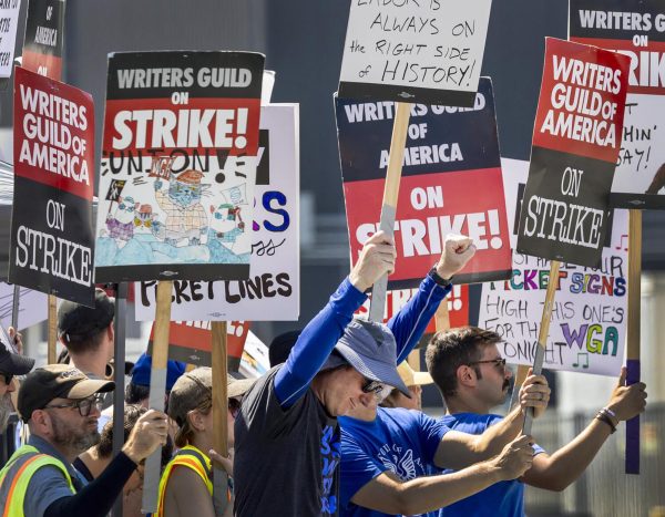 Members of the Writers Guild of America picket in front of CBS Television City in Los Angeles on Sept. 24, 2023.