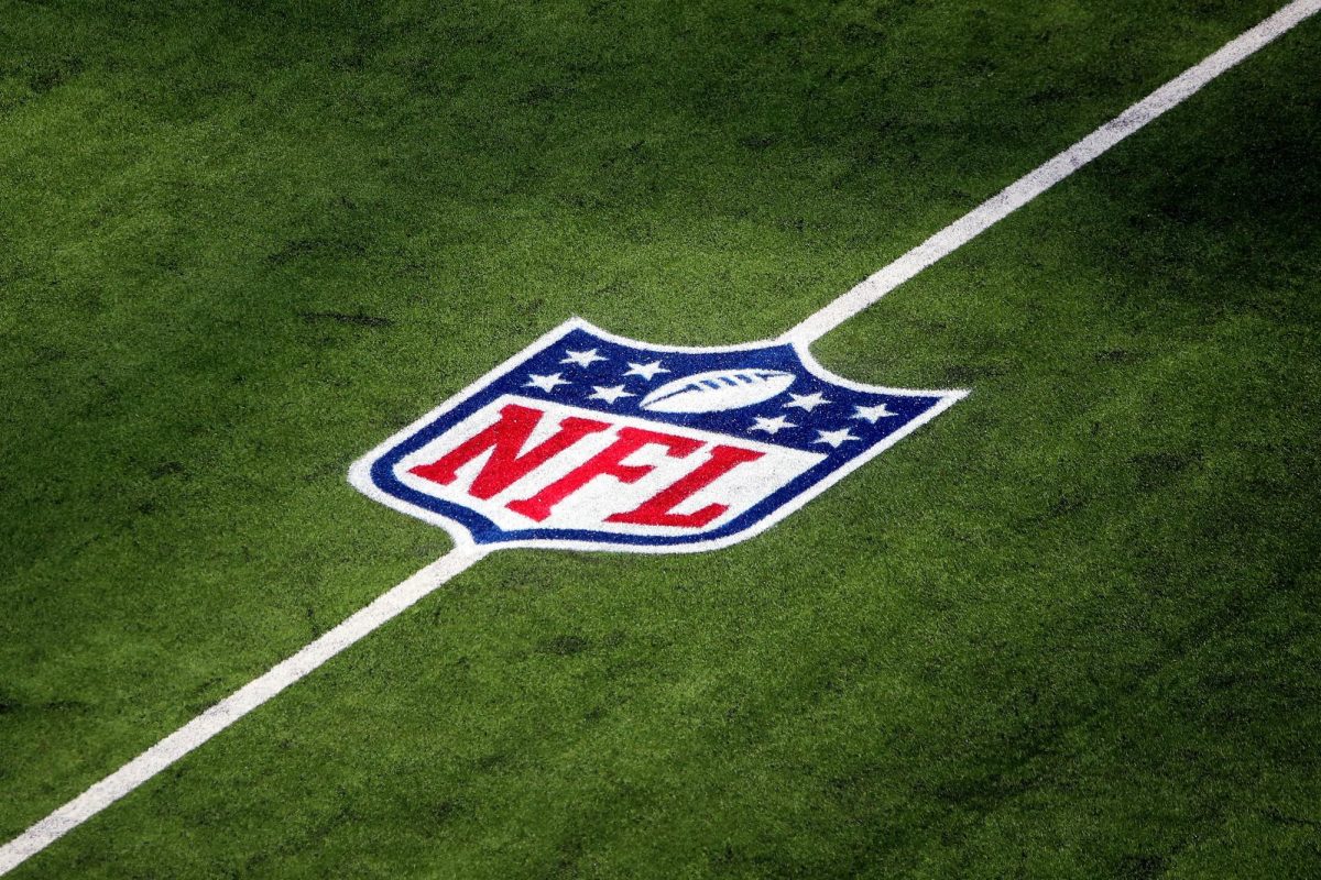 An NFL logo on the field before a game between the Arizona Cardinals and the Los Angeles Rams at SoFi Stadium on Oct. 3, 2021, in Inglewood, California. 