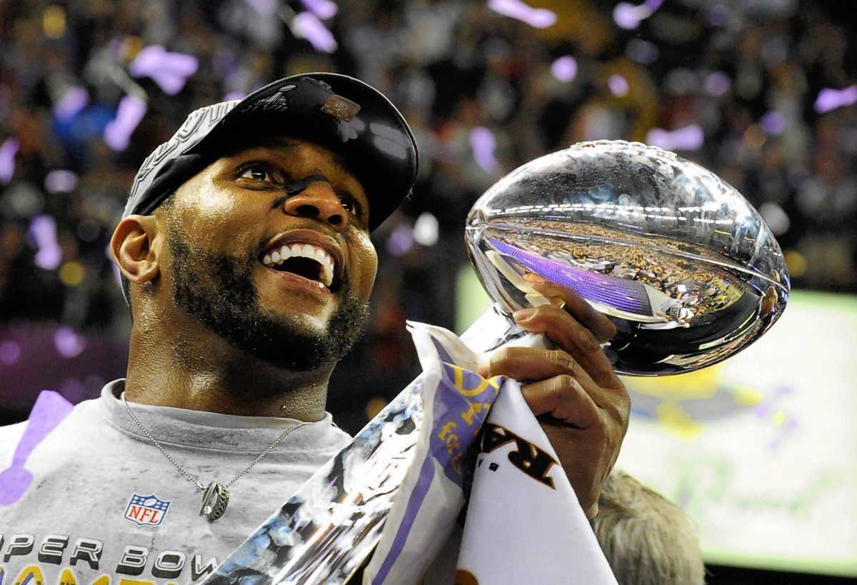 Baltimore Ravens linebacker Ray Lewis hoists the Vince Lombardi Trophy after the Ravens defeated the 49ers. 