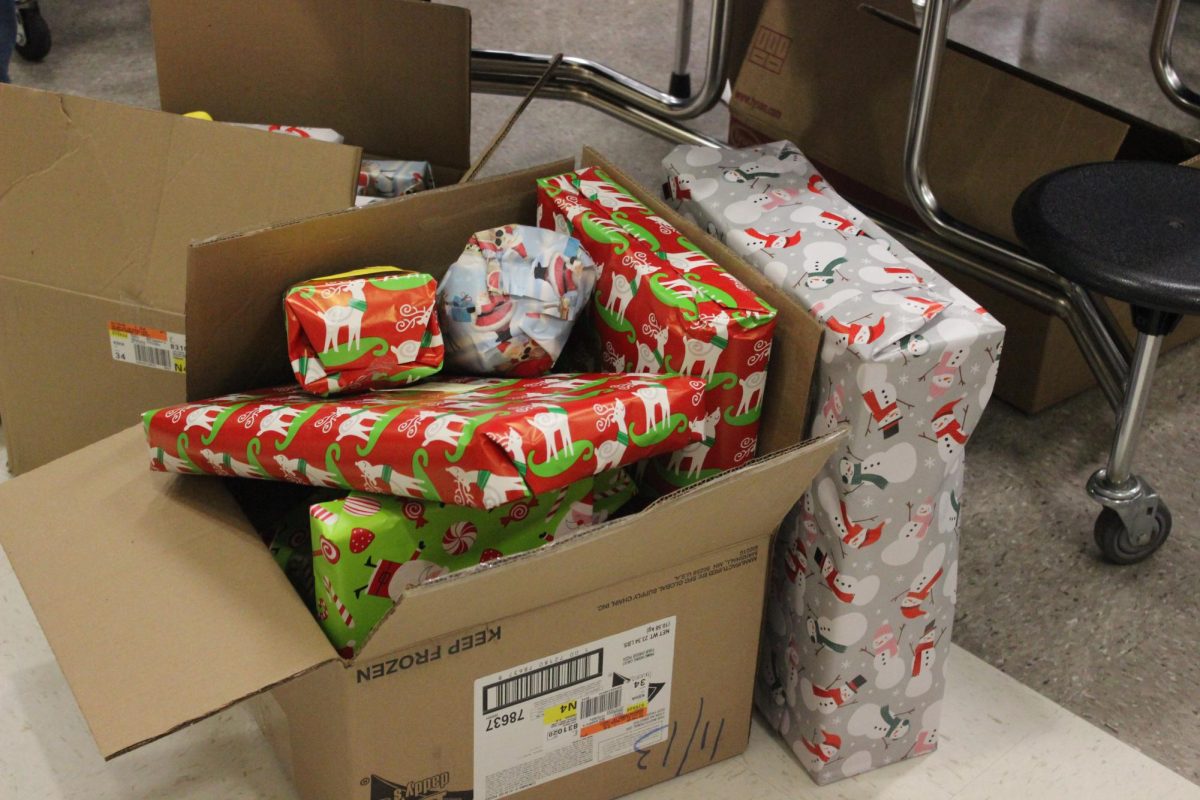 Key Club students wrapped 700 presents for community members in need on Dec. 11 in the Upper Campus cafeteria.