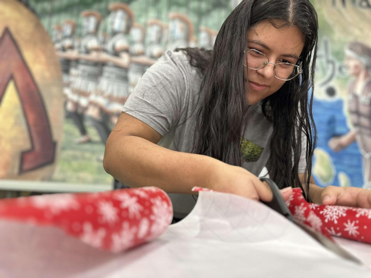 Key Club students wrapped 700 presents for community members in need on Dec. 11 in the Upper Campus cafeteria.