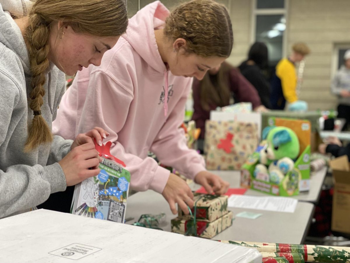Key Club students wrapped 700 presents for community members in need on Dec. 11 in the Upper Campus cafeteria.