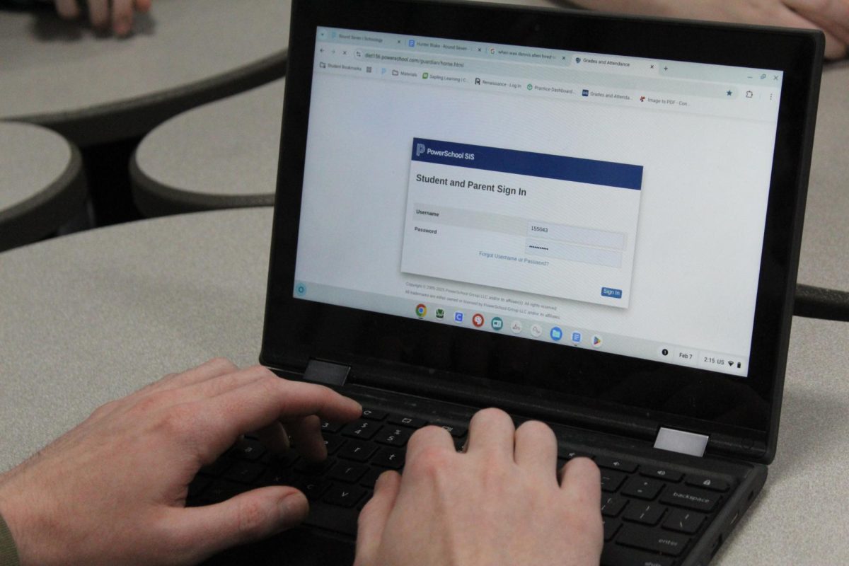 A student logs into their Powerschool account to check their information.