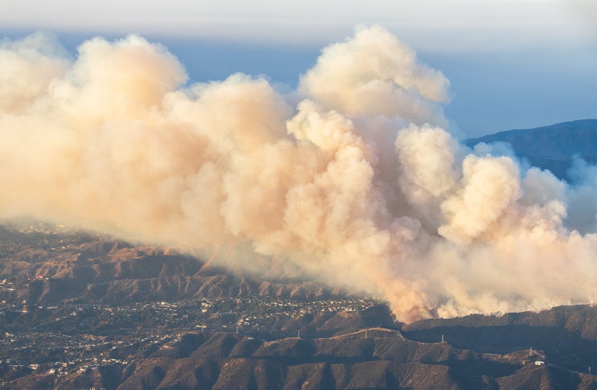 A helicopter aerial view of the Palisades fire burning in the Mountain Gate Country Club area with smoke visible from the San Fernando Valley in California on Saturday, Jan. 11, 2025. 