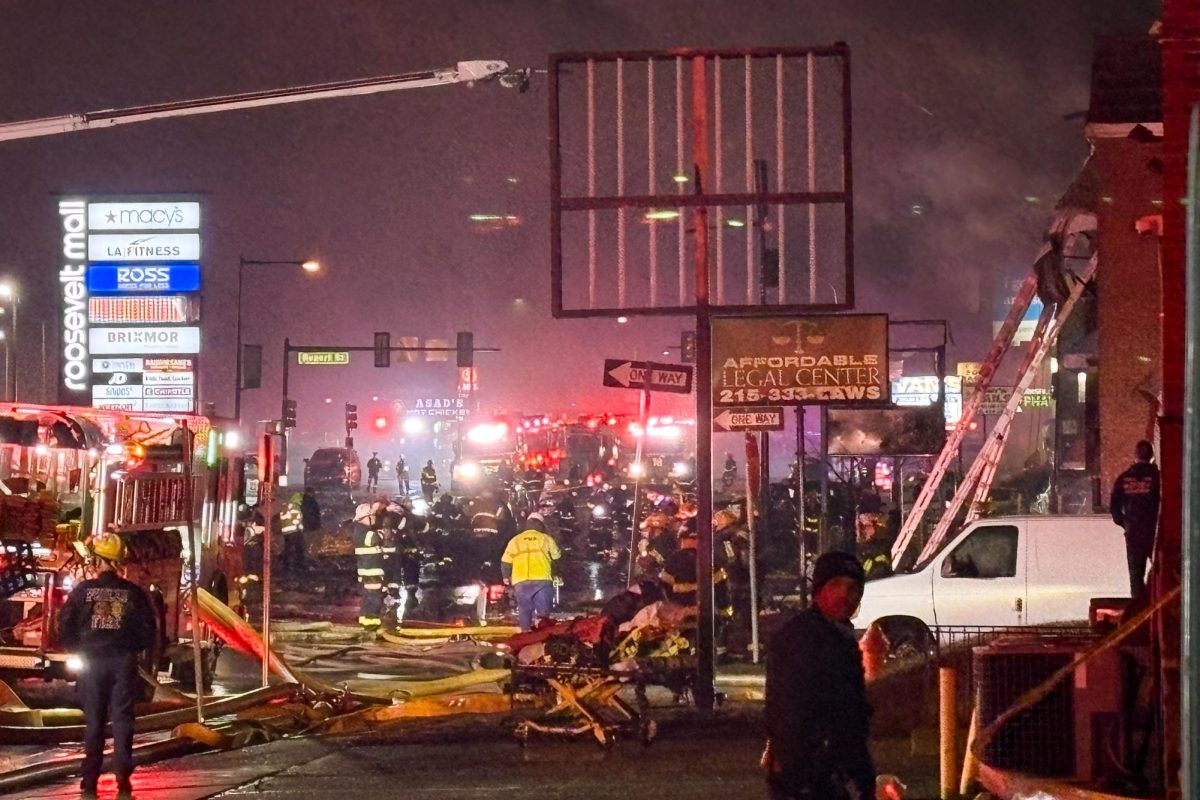 First responders after a plane was reported to have crashed near Roosevelt Mall on Friday, Jan. 31, 2025, in Philadelphia. 