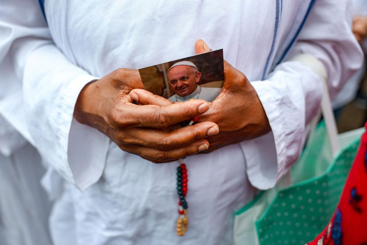 People attend a mass in Plaza Constitucion, organized by the Archdiocese of Buenos Aires, to pray for Pope Francis' health. 