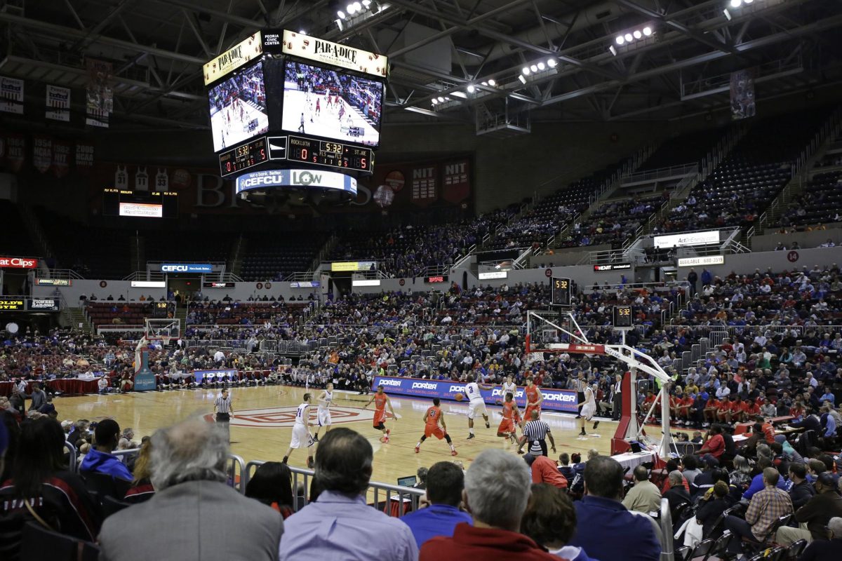 St. Joseph High School plays Rockford Lutheran High School in the first half of the Class 3A semifinals at Carver Arena on March 20, 2015, in Peoria. The Illinois High School Association will allow the boys basketball finals in Peoria to proceed, but will limit spectators to 60 per school.
