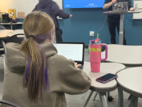 A student in AIM locks in to get her work done on Tuesday. AIM is supposed to be time for students to get their work done, though many find it difficult when so much programming is scheduled.