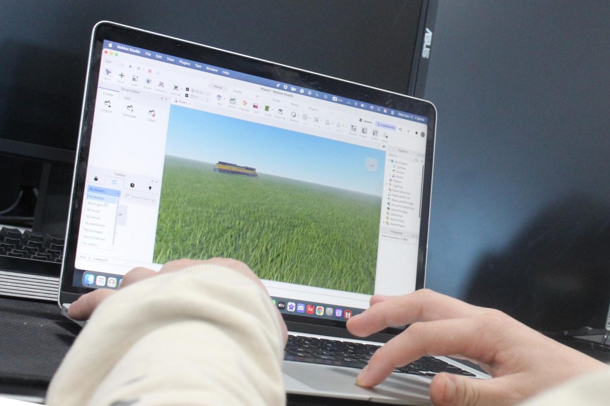 A student logs onto Roblox in Tim Kirk's classroom 282 at the Upper Campus on Dec. 17. Students in Roblox Club have been working each week to design games on the popular gaming platform.