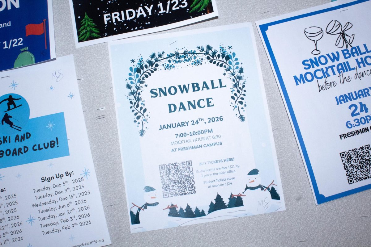 A sign hands on a bulletin board advertising next weeks SnowBall winter formal dance, which will take place on Jan. 24 at 7 p.m. in at the Freshman Campus.