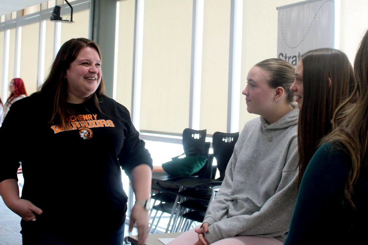 Freshman Campus Assistant Principal 
Leah Pietraszewsk welcomes eighth graders to the Upper Campus in the Warrior Room on Jan. 15 — one of the many jobs she has as one of the school's new administrators.