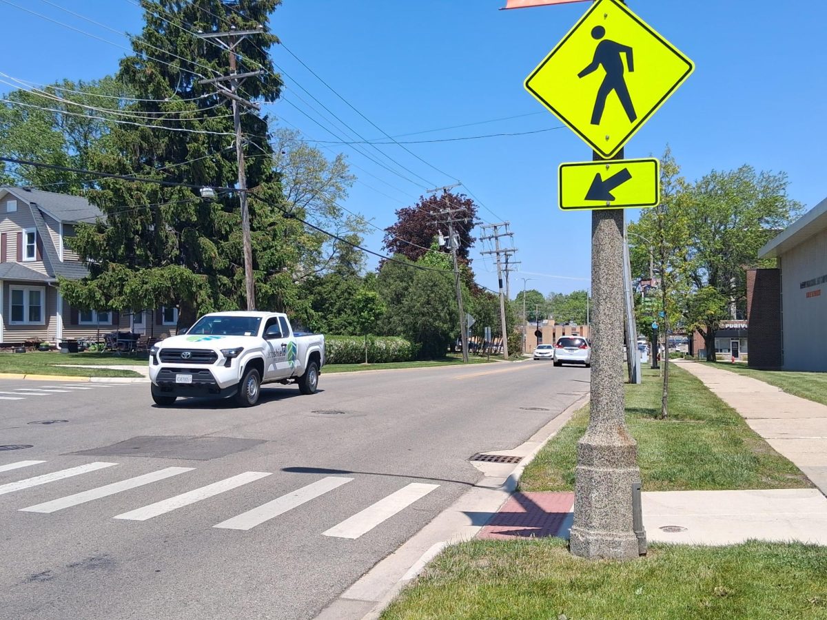 A pickup truck drives by the crosswalk outside of the Freshman Campus on May 15. Careless driving outside of the school and throughout McHenry have caused many dangerous situations for pedestrians and other drivers.